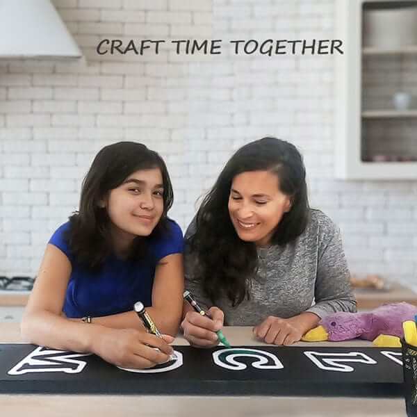Mother and daughter using Plata Chalkboard as craft activity to spend family time together mom 