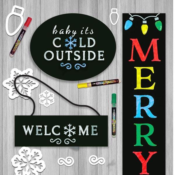 Christmas DIY Craft Kits for making stenciled Holiday door signs. Shows 3 stenciled signs- hanging welcome door sign, Baby it&#39;s cold Outside Sign, and Merry and Bright Vertical Porch sign chalkboard