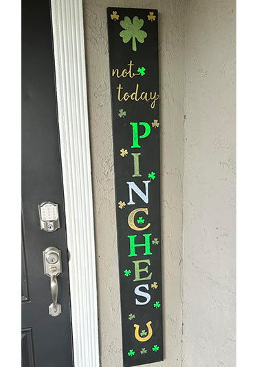 Handmade St. Patrick's Day outdoor chalkboard, created by a customer using magnetic stencils, featuring the playful quote 'Not today PINCHES' with shamrock and horseshoe accents for a personalized touch to seasonal decor