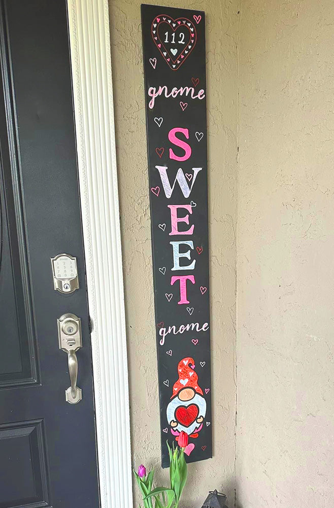 Gnome Sweet Gnome hanging vertical welcome sign UGC stenciled with gnome stencils painted in white, pink and red to make a Custom Valentine’s Day Sign