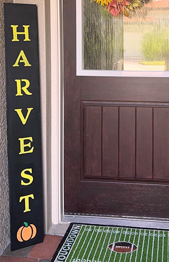 "Harvest" Large Fall Outdoor Welcome Sign Chalkboard made with a pumpkin stencil and large letter stencils painted yellow 