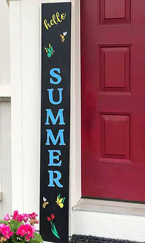 Decorative outdoor chalkboard sign with 'hello SUMMER' stenciled in bright yellow letters, surrounded by colorful butterflies and flowers, using spring chalkboard stencils and letter stencils to create a cheerful welcome sign