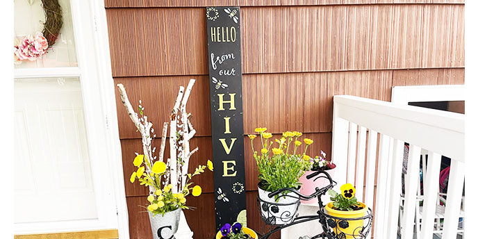 Hello from our Hive homemade welcome sign on an outdoor chalkboard, crafted with chalkboard stencils for easy summer chalkboard art