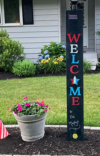 Personalized welcome sign with red, white & blue letters crafted with Porch Welcome Sign Craft Kit 