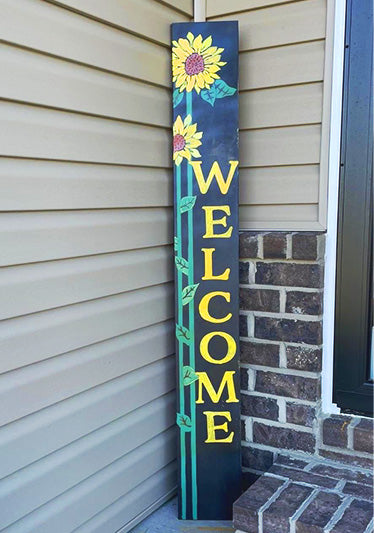 summer chalk drawing of sunflowers on a large chalkboard welcome sign, summer chalk art idea