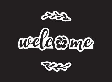 Welcome word stencil shown with a spring flower stencil  for the O in welcome surrounded by two farmhouse laurel stencils