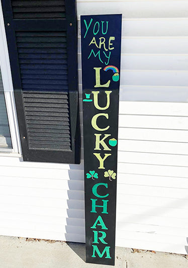 Handcrafted black St. Patrick's Day large porch sign chalkboard with 'You are my LUCKY CHARM' crafted with magnetic letter stencils is accented by shamrocks and a rainbow, ideal for personalized St. Patrick's Day decor