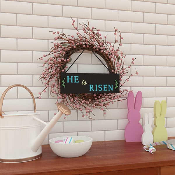 He is Risen hanging wreath sign over buffet with Easter decor 