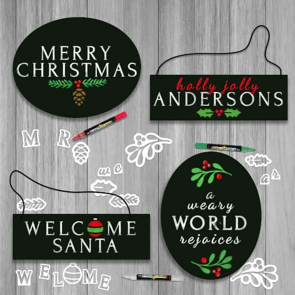 4 Plata Chalkboards decorated using Plata Christmas Chalkboard Stencils- Merry Christmas Oval Chalkboard sign, a weary world rejoices oval chalkboard sign, Welcome Santa Hanging Chalkboard Sign, personalized last name hanging door sign chalkboard 