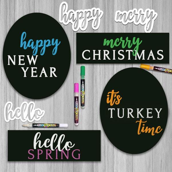 displays 4 Plata Chalkboards decorated using magnetic calligraphy stencils to create holiday signs. Happy New Year Chalkboard Sign, Merry Christmas Wreath Sign, it&#39;s Turkey Time Thanksgiving Sign and Hello Spring Wreath Chalkboard Sign by Plata Chalkboards