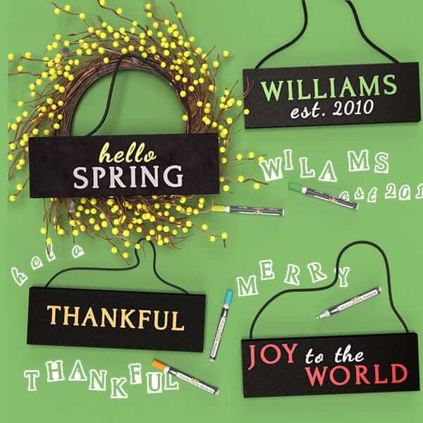 Examples of door signs made with chalkboard sign kit. Hello Spring wreath sign, Thankful hanging sign, Joy to the World Christmas Chalkboard sign, Last name hanging sign. Signs made with magnetic chalkboard stencil letters