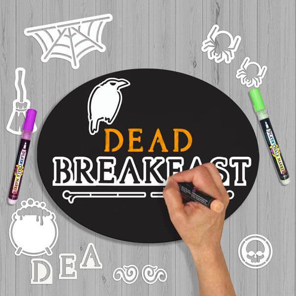 Shows how to make a chalkboard with magnetic letter and design stencils- crafting a Halloween Dead and Breakfast Sign with Halloween stencils and paint pens
