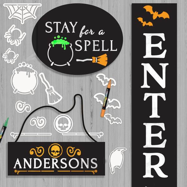 3 Plata Chalkboards decorated with Halloween Stencils to craft a Halloween signs. Stay for a Spell oval chalkboard sign with cauldron stencil and broom stencil, Hanging chalkboard sign stenciled with last name and grave yard stencils, and Enter if You Dare Halloween Porch Sign 